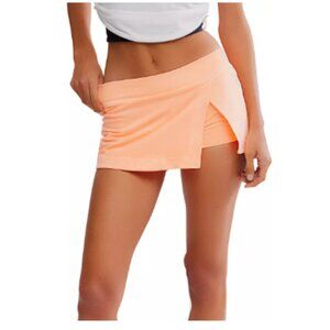 FP Movement Women's Hot Shot Mini Skort/Color: Pastel Peach